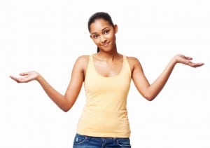 young girl shrugging