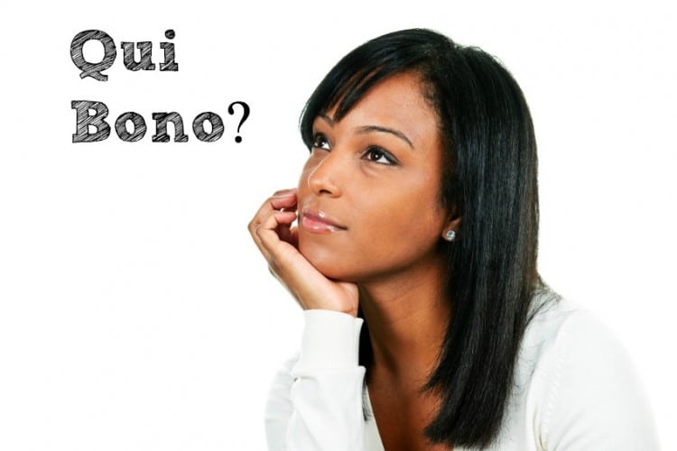 Thoughtful black woman looking up portrait isolated on white background