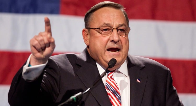 FILE - In this file photo made Sunday, May 6, 2012, Gov. Paul LePage speaks at the Maine GOP convention. In his effort to cut state spending, Gov. LePage proposed revamping the stateâs Medicaid program. Supporters of the cuts say spending is unsustainable and that Maine provides Medicaid coverage to 35 percent more of the population that the national average. (AP Photo/Robert F. Bukaty, File)