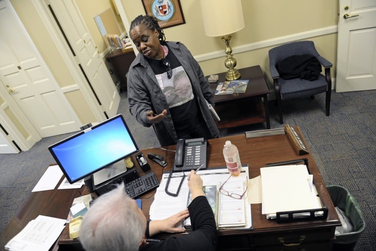 ANNAPOLIS, MD - FEBRUARY 1: Vontasha Simms talks with Melinda Hamilton, aid to Maryland Del. Edith J. Patterson February 01, 2016 in Annapolis, MD.  Simms, grandmother of Ji'Aire Lee, 3, who died while his mother, Romechia Simms, pushed him on a swing for 40 hours, visits legislators at the Maryland General Assembly to try and pass mental health reform. (Photo by Katherine Frey/The Washington Post)