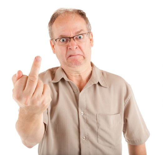 Man displeased about something is showing the middle finger.
