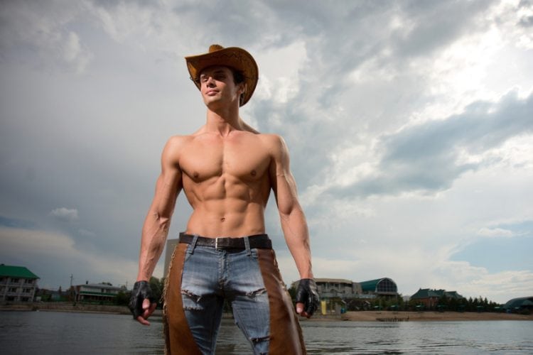 A young man in the image of a cowboy, muscular sexy man, sexy cowboy